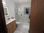 Mirror Plumbing fixture Bathroom cabinet Tap Property